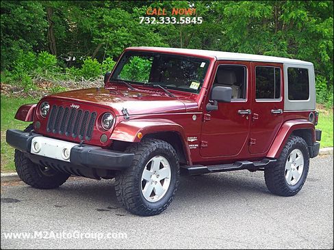 Used 2010 Jeep Wrangler Unlimited Sahara w/ Dual Top Group image 25