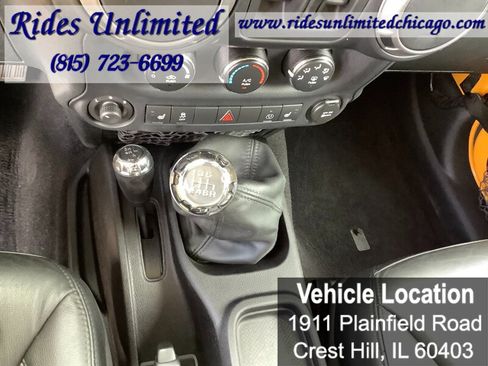 Used 2013 Jeep Wrangler Unlimited Sahara w/ Dual Top Group AWD/4WD image 16
