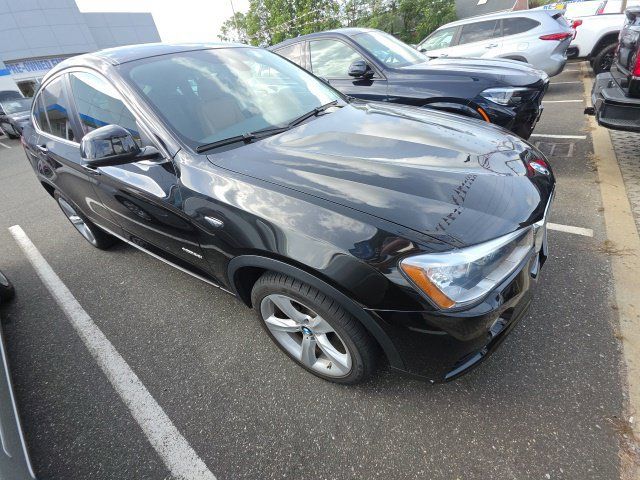 Used 2016 BMW X4 xDrive28i AWD/4WD image 1