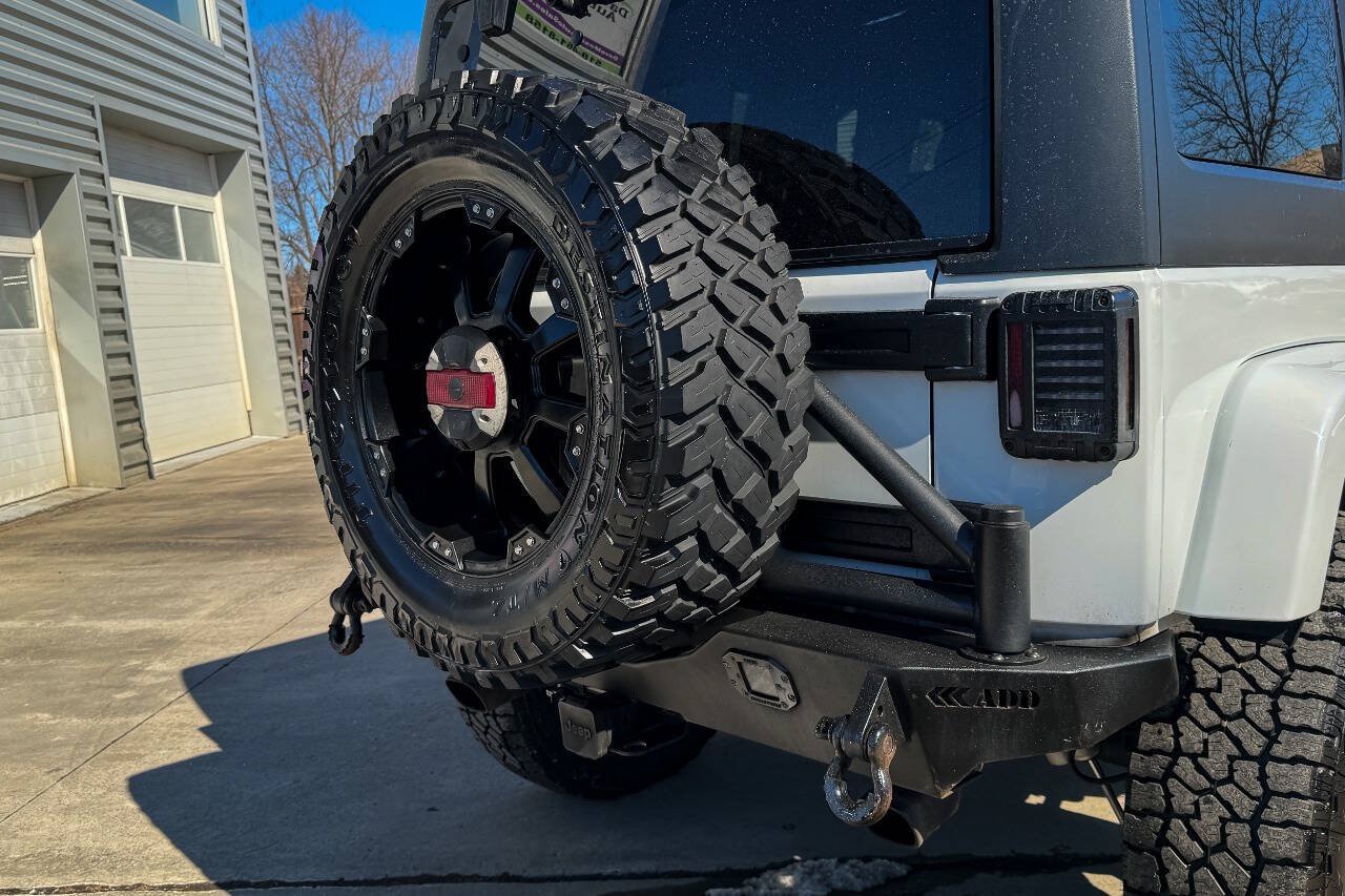 Used 2014 Jeep Wrangler Unlimited Sahara w/ Dual Top Group AWD/4WD image 20