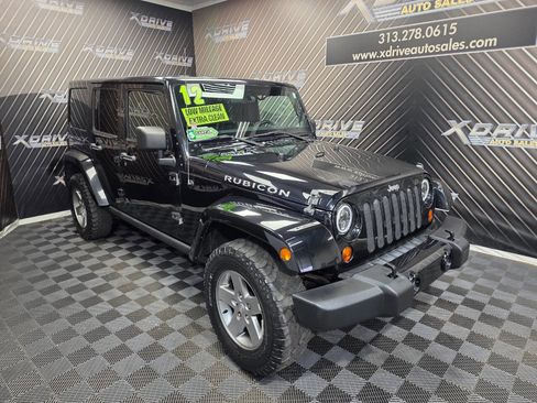 Used 2012 Jeep Wrangler Unlimited Rubicon w/ Dual Top Group image 7