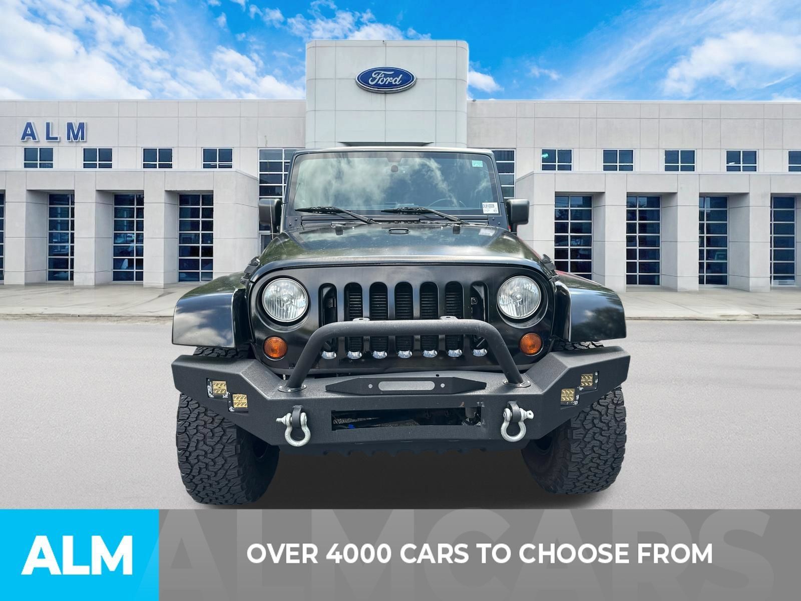 Used 2013 Jeep Wrangler Unlimited Sahara AWD/4WD image 2