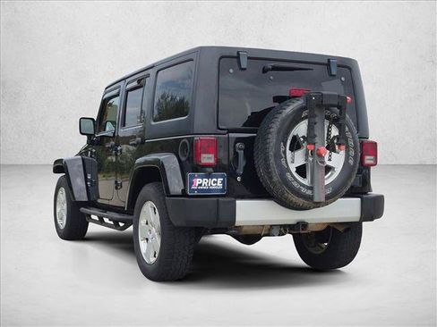 Used 2011 Jeep Wrangler Unlimited Sahara w/ Dual Top Group AWD/4WD image 8