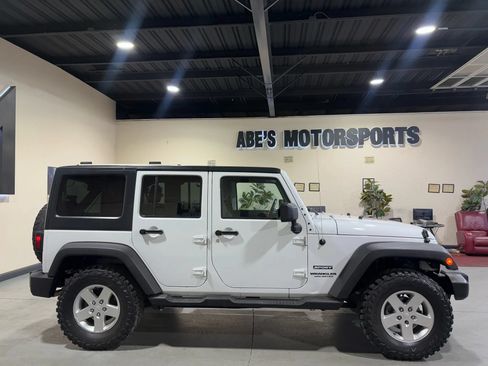 Used 2013 Jeep Wrangler Unlimited Sport AWD/4WD image 9