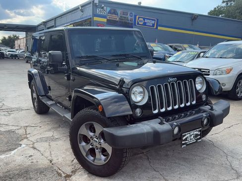 Used 2016 Jeep Wrangler Unlimited Sahara w/ Connectivity Group image 1