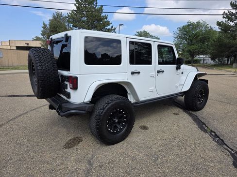 Used 2013 Jeep Wrangler Unlimited Sahara w/ Dual Top Group AWD/4WD image 8