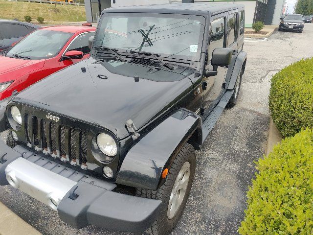 Used 2014 Jeep Wrangler Unlimited Sahara w/ Dual Top Group AWD/4WD image 4