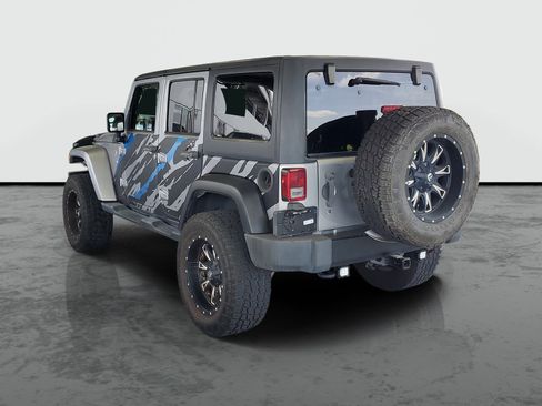 Used 2014 Jeep Wrangler Unlimited Sahara w/ Dual Top Group AWD/4WD image 3