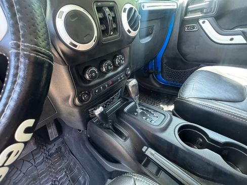 Used 2014 Jeep Wrangler Unlimited Sahara AWD/4WD image 24