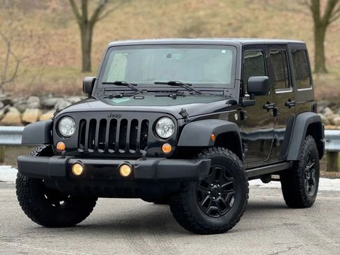 Used 2015 Jeep Wrangler Unlimited Sport AWD/4WD image 1
