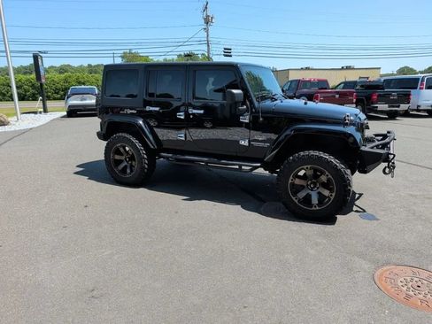 Used 2012 Jeep Wrangler Unlimited Sahara w/ Dual Top Group AWD/4WD image 6