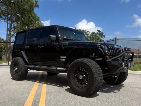Used 2011 Jeep Wrangler Unlimited Sport AWD/4WD image 6
