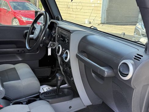 Used 2010 Jeep Wrangler Unlimited Sahara w/ Dual Top Group image 11