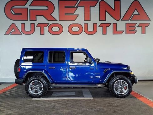 Used 2019 Jeep Wrangler Unlimited Sahara w/ Uconnect 4C Nav & Sound Group AWD/4WD image 1