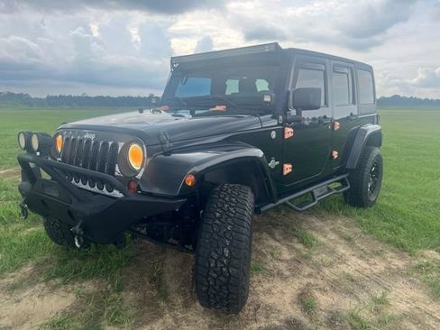 Used 2013 Jeep Wrangler Unlimited Sport AWD/4WD image 2