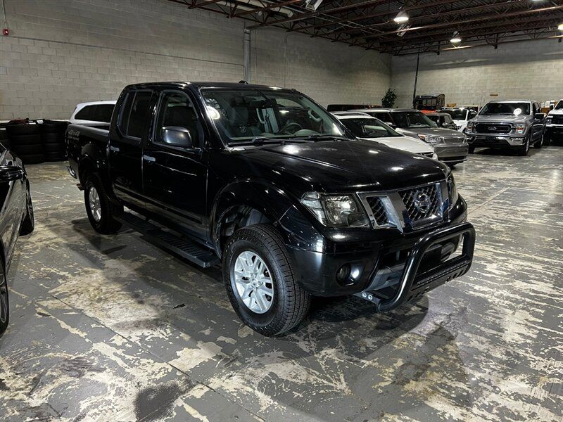 Used 2014 Nissan Frontier SV w/ SV Value Truck Package AWD/4WD image 1