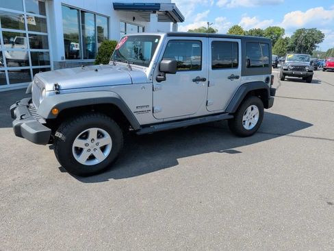 Used 2013 Jeep Wrangler Unlimited Sport AWD/4WD image 1