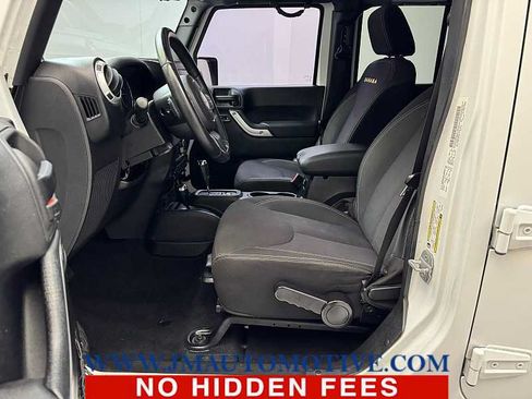 Used 2013 Jeep Wrangler Unlimited Sahara w/ Dual Top Group AWD/4WD image 12