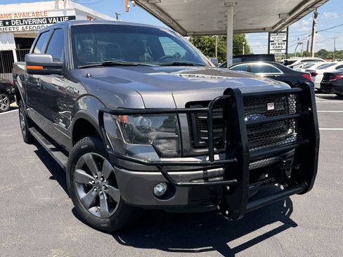 Used 2014 Ford F150 FX4 w/ Equipment Group 402A Luxury AWD/4WD image 1