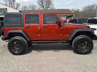 Used 2014 Jeep Wrangler Unlimited Rubicon w/ Dual Top Group