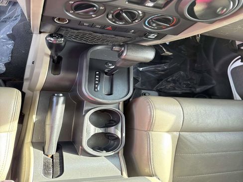 Used 2010 Jeep Wrangler Unlimited Rubicon w/ Dual Top Group image 24