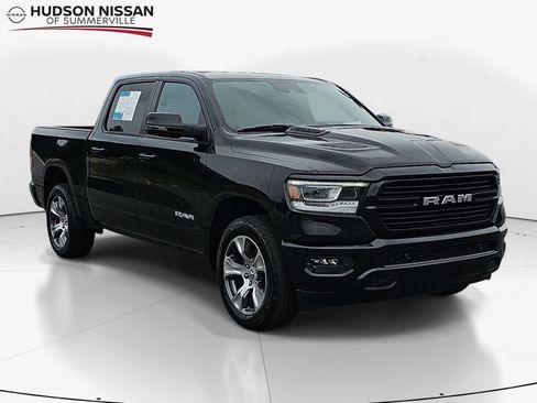 Used 2024 RAM 1500 Laramie AWD/4WD image 1