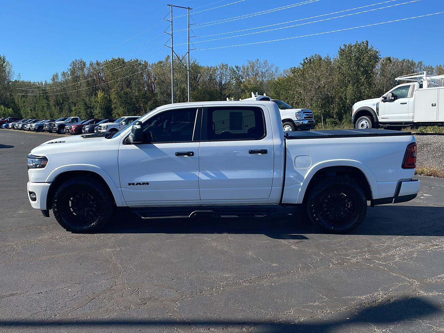 Used 2025 RAM 1500 Laramie w/ Night Edition AWD/4WD image 2