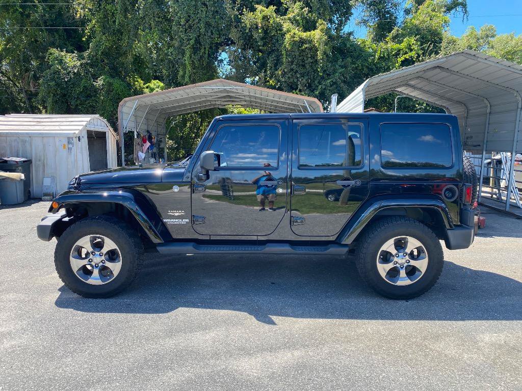 Used 2012 Jeep Wrangler Unlimited Sahara w/ Connectivity Group AWD/4WD image 1