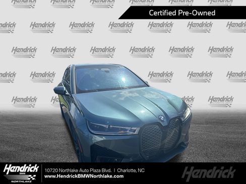 Used 2024 BMW iX xDrive50 w/ Premium Package AWD/4WD image 1