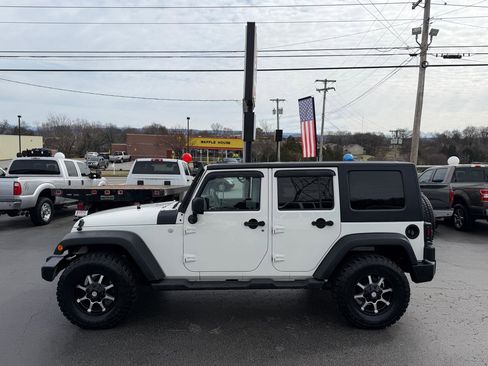 Used 2010 Jeep Wrangler Unlimited Sport image 1