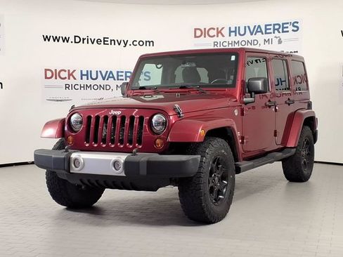 Used 2012 Jeep Wrangler Unlimited Sahara w/ Trailer Tow Group AWD/4WD image 1