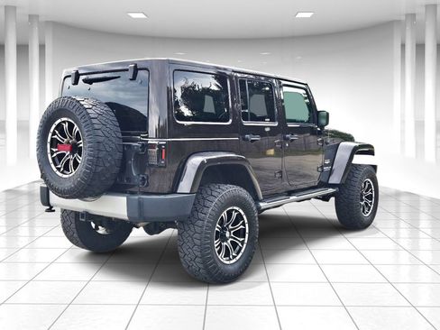 Used 2013 Jeep Wrangler Unlimited Sahara w/ Dual Top Group AWD/4WD image 3