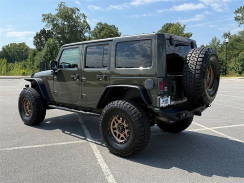 Used 2015 Jeep Wrangler Unlimited Rubicon w/ Dual Top Group AWD/4WD image 3