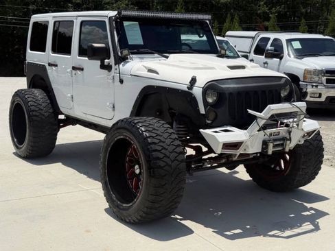 Used 2015 Jeep Wrangler Unlimited Rubicon w/ Dual Top Group AWD/4WD image 1