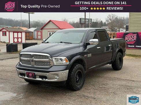 Used 2014 RAM 1500 Laramie w/ Convenience Group AWD/4WD image 1