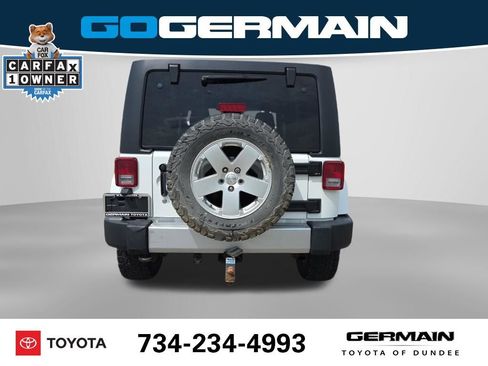 Used 2012 Jeep Wrangler Unlimited Sahara w/ Dual Top Group AWD/4WD image 9