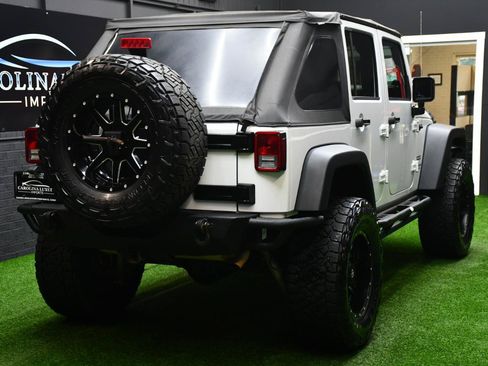 Used 2013 Jeep Wrangler Unlimited Sport w/ Connectivity Group AWD/4WD image 11