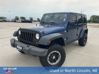 Used 2010 Jeep Wrangler Unlimited Rubicon w/ Dual Top Group