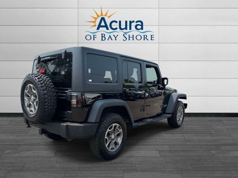 Used 2013 Jeep Wrangler Unlimited Rubicon w/ Dual Top Group AWD/4WD image 6