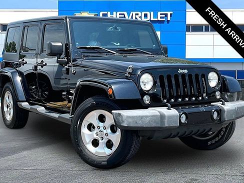 Used 2014 Jeep Wrangler Unlimited Sahara AWD/4WD image 1