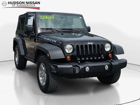 Used 2012 Jeep Wrangler Rubicon w/ Dual Top Group AWD/4WD image 1