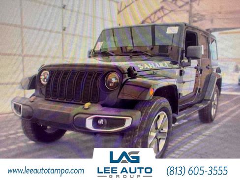 Used 2012 Jeep Wrangler Unlimited Sahara AWD/4WD image 1