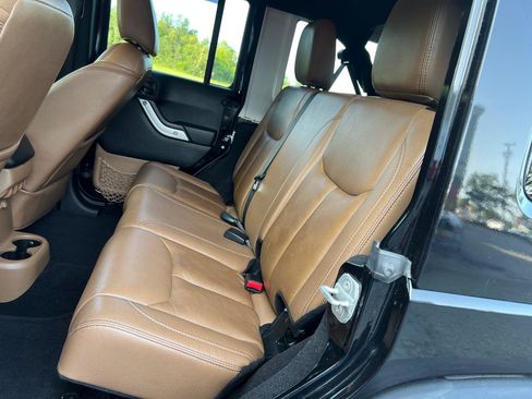 Used 2014 Jeep Wrangler Unlimited Rubicon w/ Dual Top Group AWD/4WD image 11