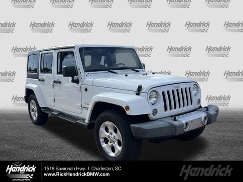 Used 2015 Jeep Wrangler Unlimited Sahara w/ Dual Top Group image 1