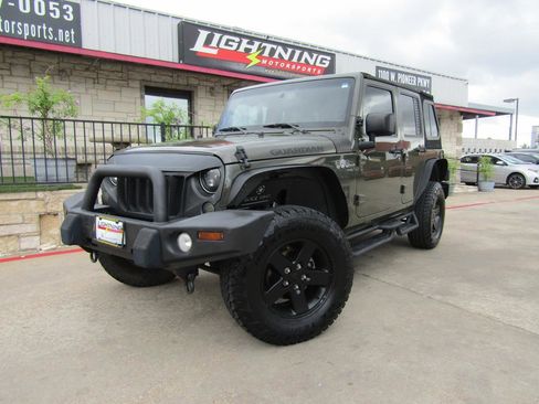 Used 2016 Jeep Wrangler Unlimited Sport image 1