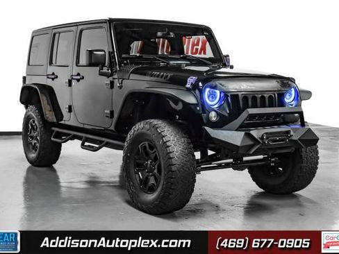 Used 2016 Jeep Wrangler Unlimited Sport image 1