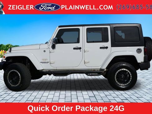 Used 2012 Jeep Wrangler Unlimited Sahara w/ Dual Top Group AWD/4WD image 2