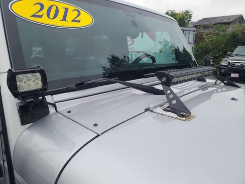 Used 2012 Jeep Wrangler Unlimited Sport w/ Dual Top Group AWD/4WD image 23