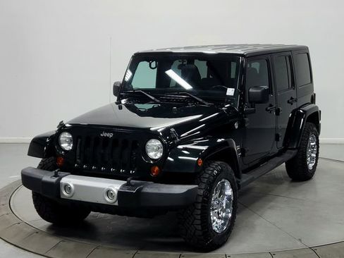 Used 2012 Jeep Wrangler Unlimited Sahara w/ Dual Top Group AWD/4WD image 3