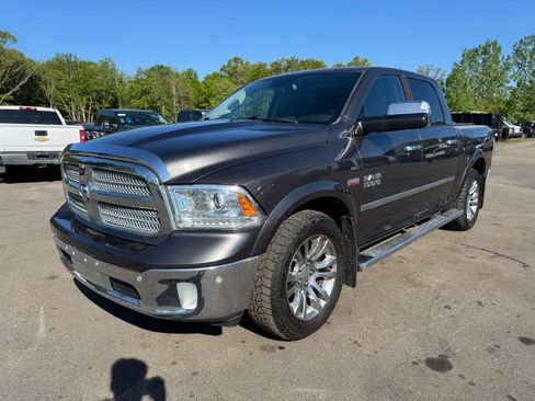 Used 2015 RAM 1500 Laramie Limited AWD/4WD image 1